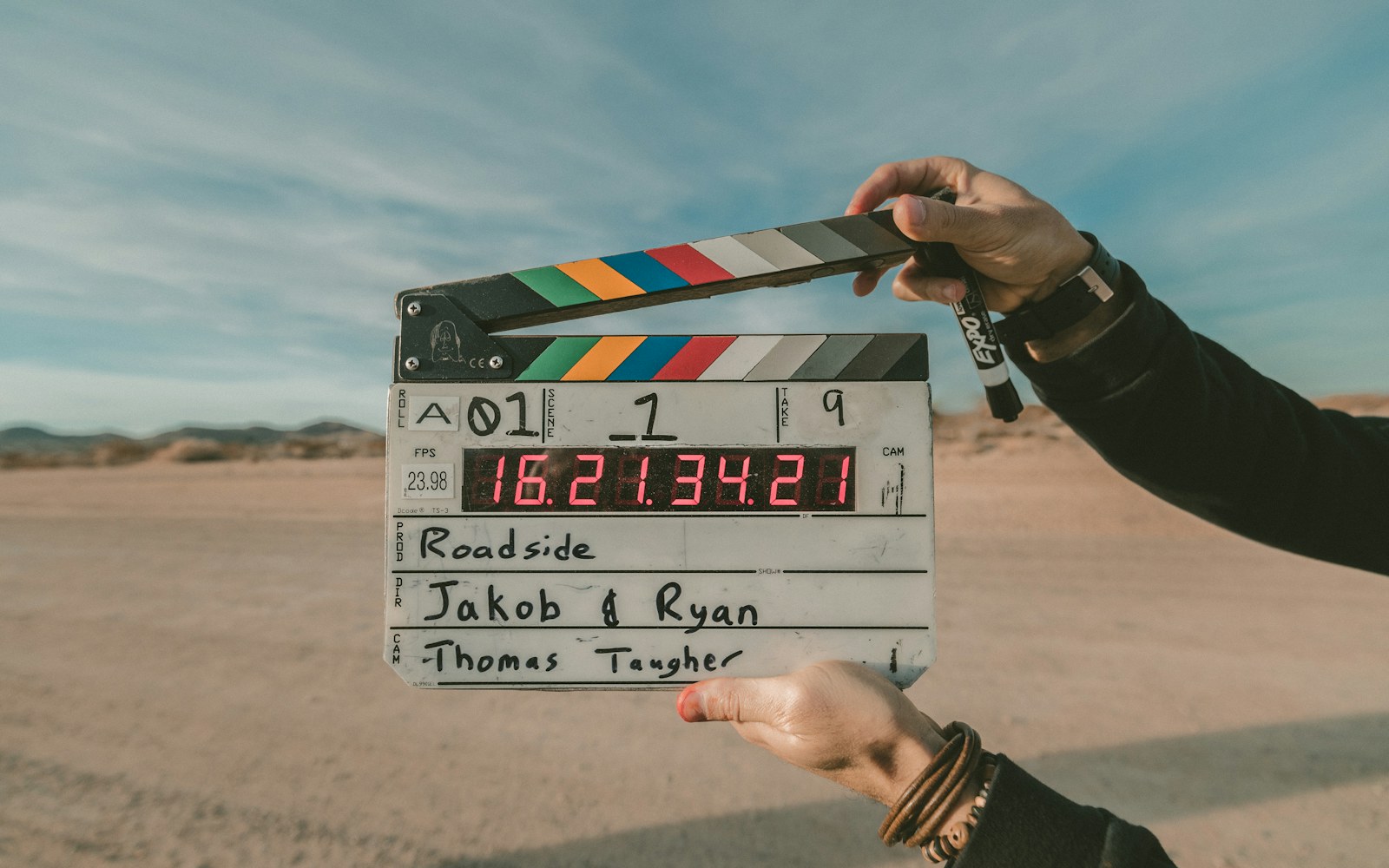 A creator switching between recorded episodes, calls, and live chat; editorial scene